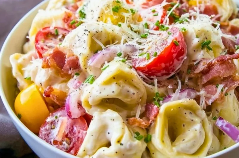 Delicious grinder tortellini salad with fresh vegetables and dressing