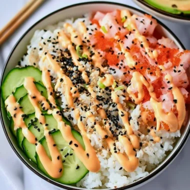 California Roll Sushi Bowl featuring fresh ingredients like cucumber, crab, and avocado.