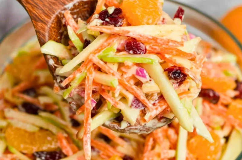 Colorful Carrot Apple Salad with fresh ingredients on a plate