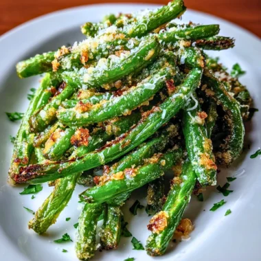 Crispy garlic parmesan roasted green beans on a plate