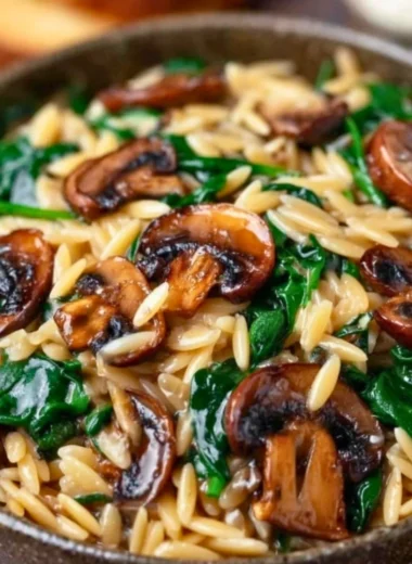 Creamy Garlic Butter Orzo with Mushrooms and Spinach in a bowl