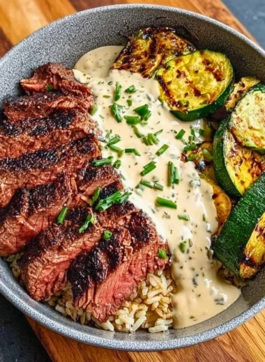 Delicious grilled steak bowl with zucchini and savory sauce