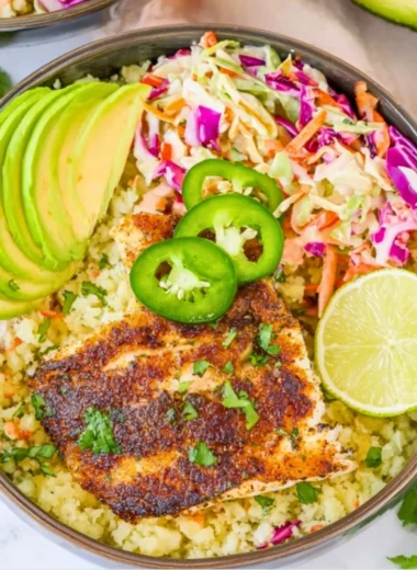 Low carb fish taco bowl with fresh ingredients and toppings