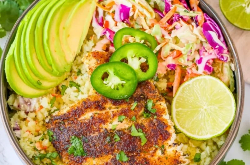 Low carb fish taco bowl with fresh ingredients and toppings
