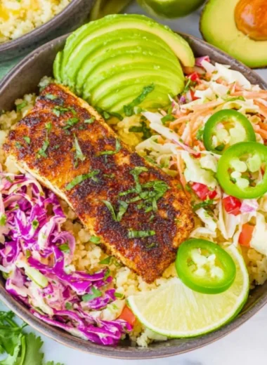 Delicious low carb fish taco bowls with fresh ingredients and vibrant toppings.