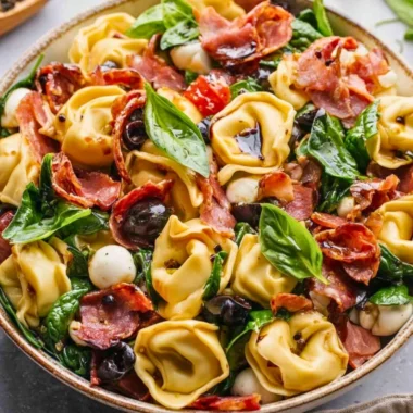 Tuscan Tortellini Salad with fresh ingredients and vibrant colors