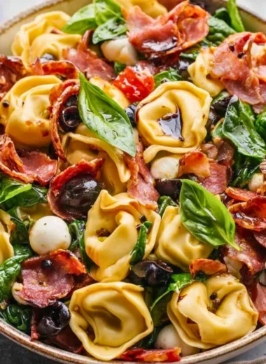 Tuscan Tortellini Salad with fresh ingredients and vibrant colors