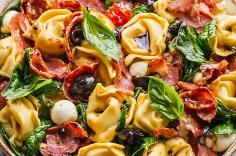 Tuscan Tortellini Salad with fresh ingredients and vibrant colors