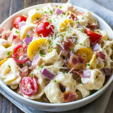 Delicious Grinder Tortellini Salad served in a bowl with fresh ingredients
