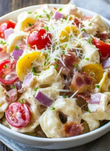 Delicious Grinder Tortellini Salad served in a bowl with fresh ingredients