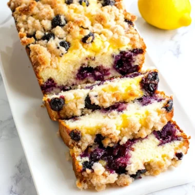 Freshly baked Blueberry Lemon Loaf with blueberries and lemon zest