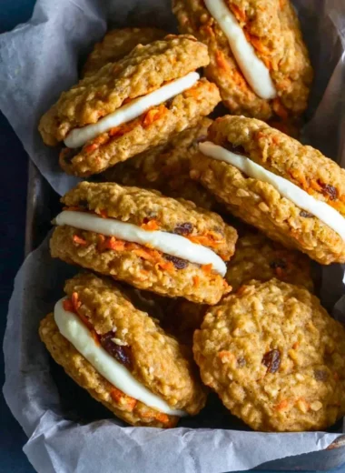 Delicious carrot cake cookies with cream cheese frosting on a plate