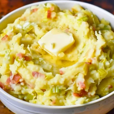 Delicious Colcannon dish featuring mashed potatoes and greens served in a bowl.