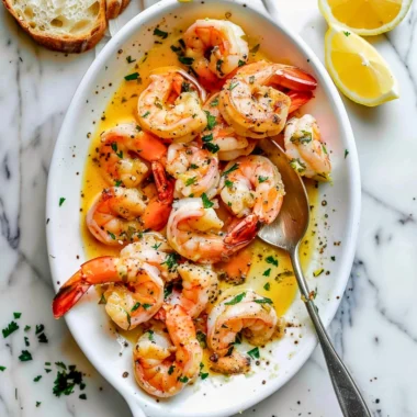 Delicious garlic butter shrimp scampi served with pasta and herbs