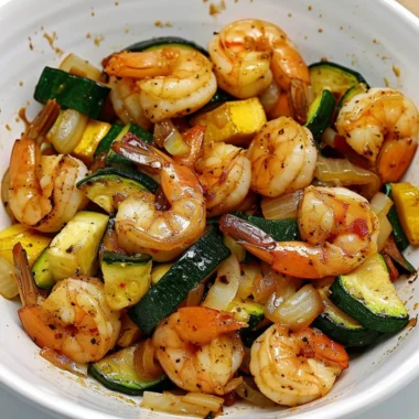 Delicious Hibachi Shrimp Rice Bowl with colorful vegetables and savory sauce.