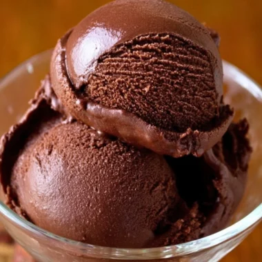 Delicious homemade chocolate sorbet in a bowl with chocolate shavings.