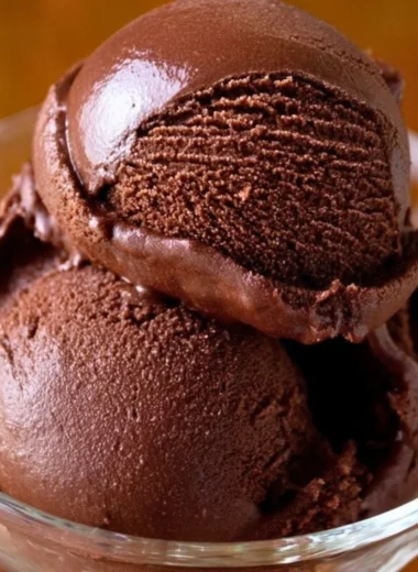 Delicious homemade chocolate sorbet in a bowl with chocolate shavings.