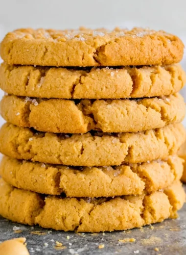 Freshly baked peanut butter cookies on a cooling rack