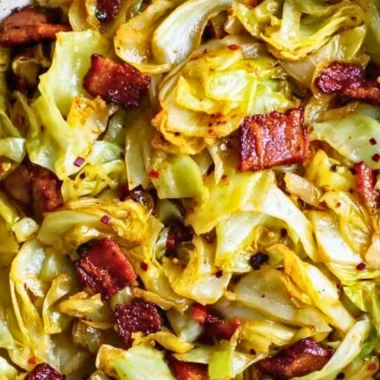 Plate of Southern Fried Cabbage with seasoning and bacon