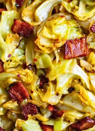 Plate of Southern Fried Cabbage with seasoning and bacon