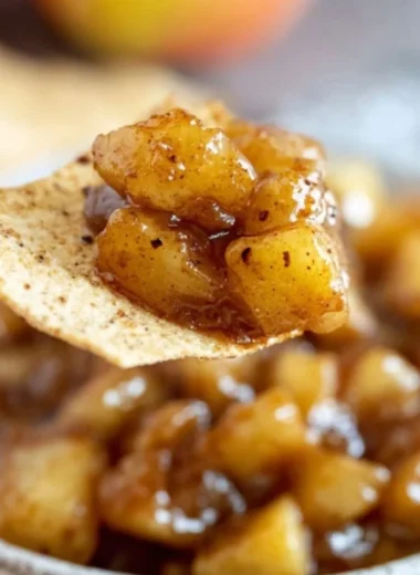 Delicious apple pie dip served with cinnamon sugar chips and fresh apples