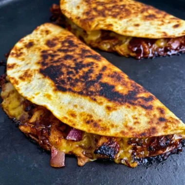 Deliciously grilled Blackstone hot honey BBQ chicken quesadillas