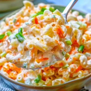 Bowl of Classic Hawaiian Macaroni Salad with colorful vegetables
