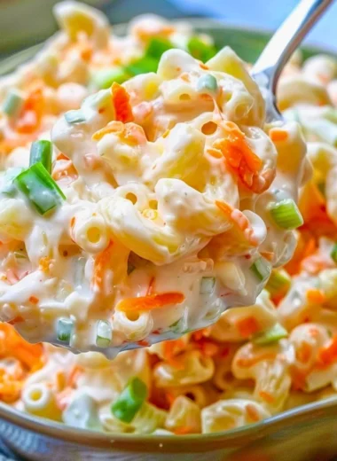 Bowl of Classic Hawaiian Macaroni Salad with colorful vegetables
