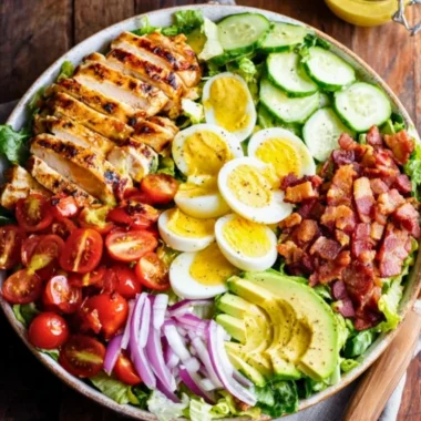 Delicious Grilled Chicken Cobb Salad with fresh vegetables and toppings