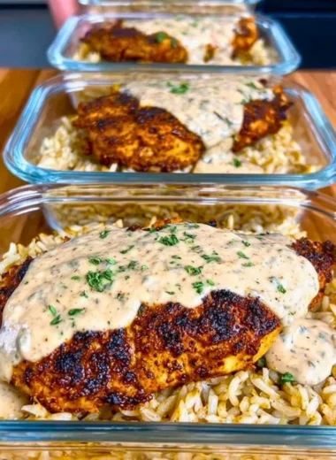 Creamy Cajun chicken and rice dish with spices and herbs
