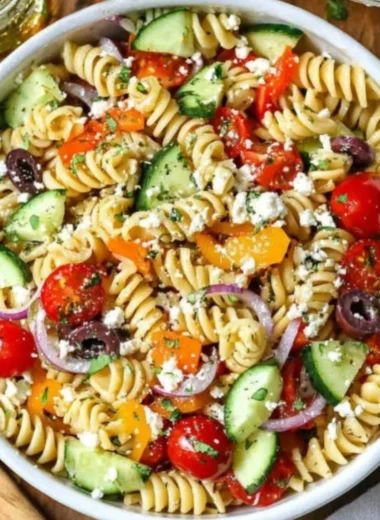 Delicious summer pasta salad featuring fresh ingredients and vibrant colors.