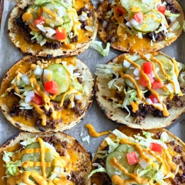 Delicious smashed cheeseburger tacos served with fresh toppings