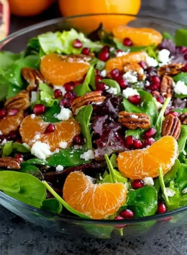 Colorful winter salad with seasonal greens and toppings