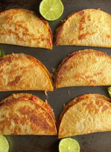 Delicious baked chicken tacos served with fresh toppings in a crispy shell.