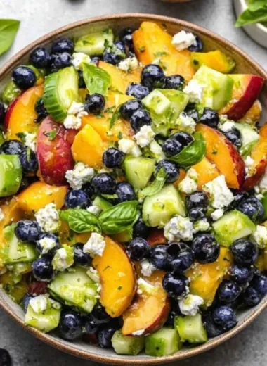 Fresh blueberry peach feta salad with vibrant fruits and creamy feta cheese