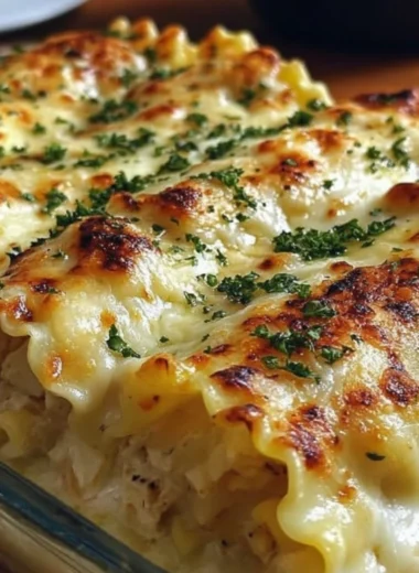 Plate of Chicken Alfredo Lasagna Rolls garnished with parsley