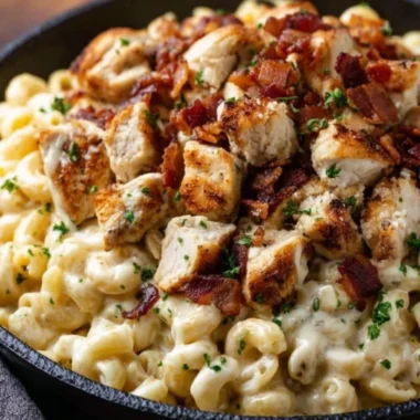 Creamy Chicken Ranch Macaroni and Cheese served with a sprinkle of herbs