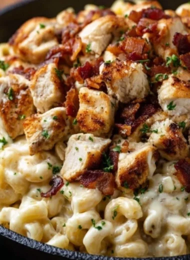 Creamy Chicken Ranch Macaroni and Cheese served with a sprinkle of herbs