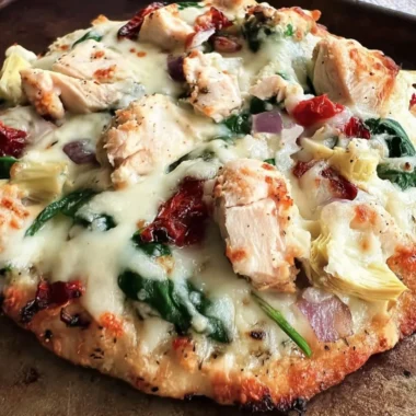 Delicious Chicken Spinach Artichoke Pizza with fresh ingredients