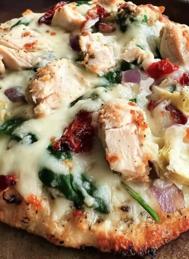 Delicious Chicken Spinach Artichoke Pizza with fresh ingredients