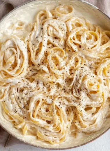 Cottage Cheese Alfredo sauce served over pasta in a bowl