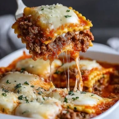 Delicious Million Dollar Ravioli Casserole served in a baking dish with cheese