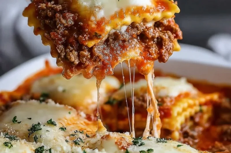 Delicious Million Dollar Ravioli Casserole served in a baking dish with cheese