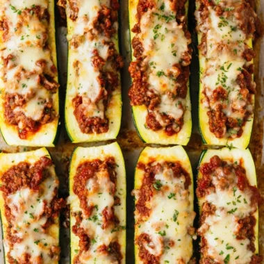 Savory stuffed zucchini boats filled with vegetables and herbs for a healthy meal.