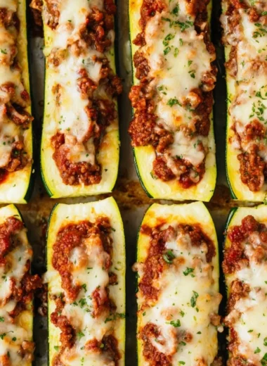 Savory stuffed zucchini boats filled with vegetables and herbs for a healthy meal.